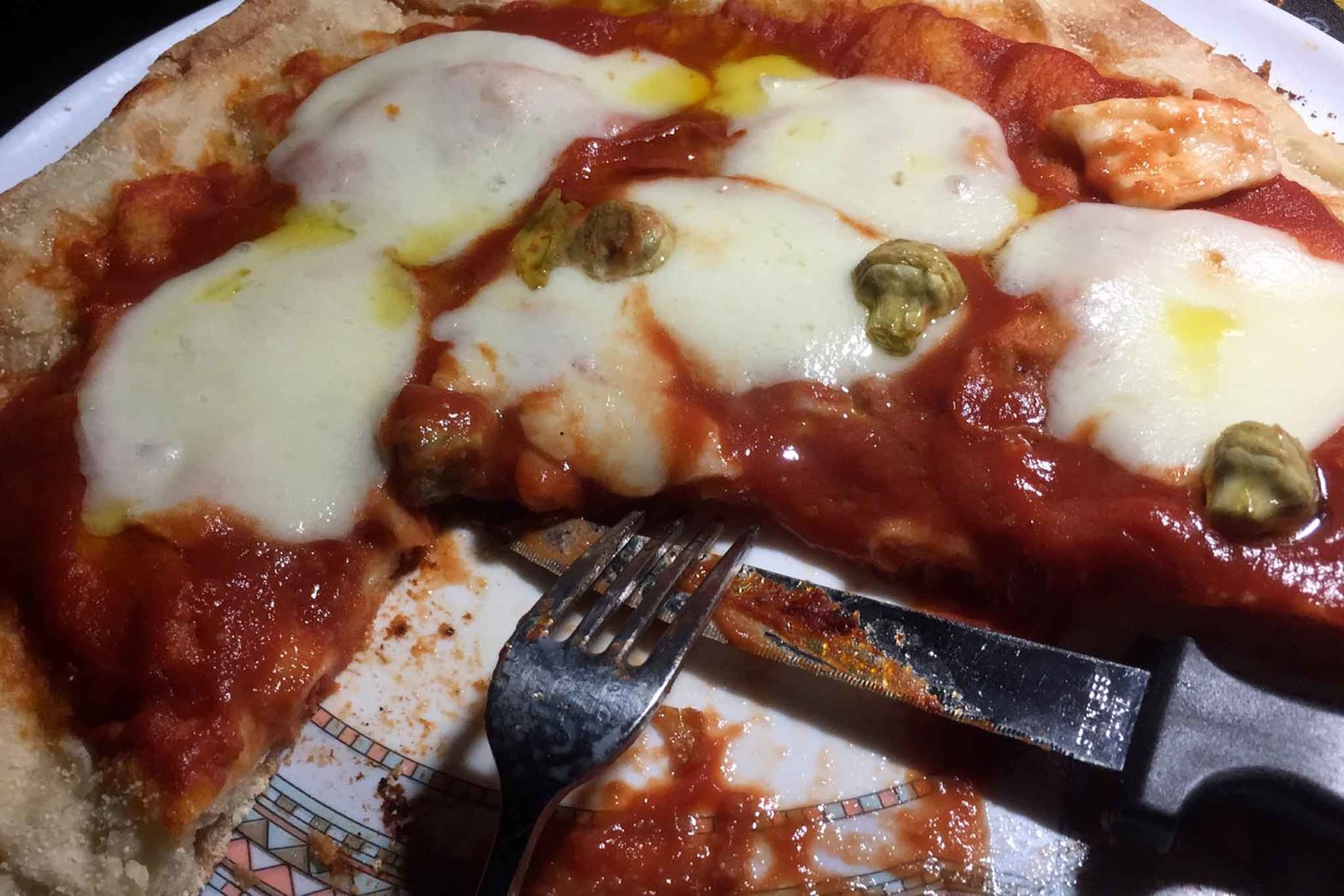 pizza preparata a casa con base precotta