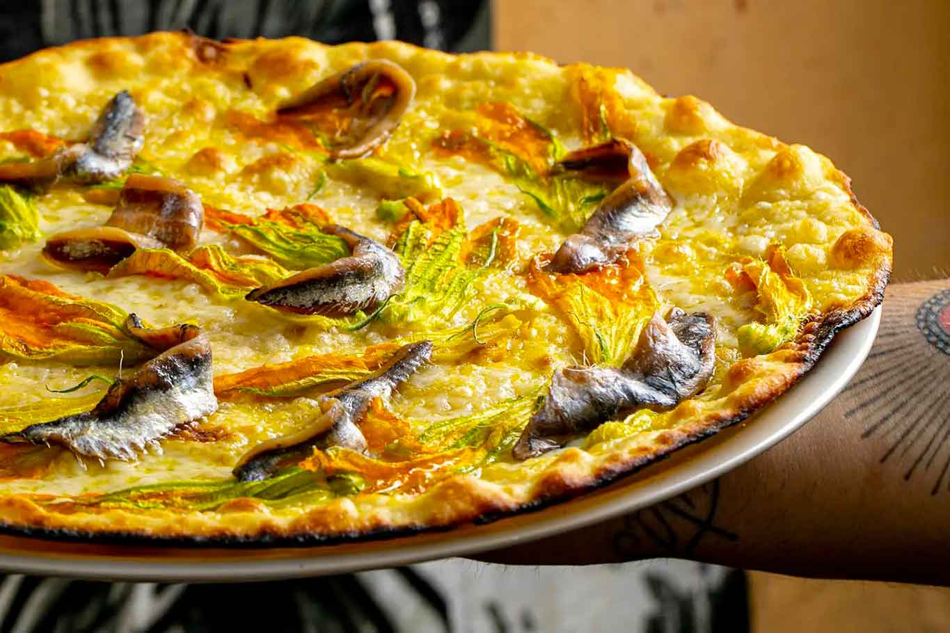 Roma: le 5 migliori pizzerie romane  che fanno della scrocchiarella un mito