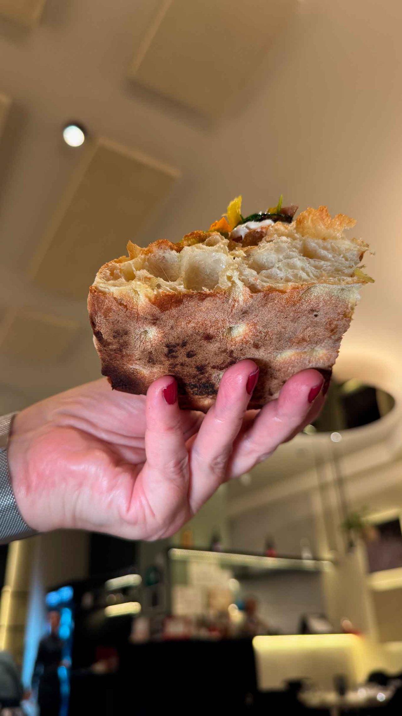la cottura della pizza zucchina in fiore della pizzeria Raf Bonetta a Pozzuoli al Campionato 2025