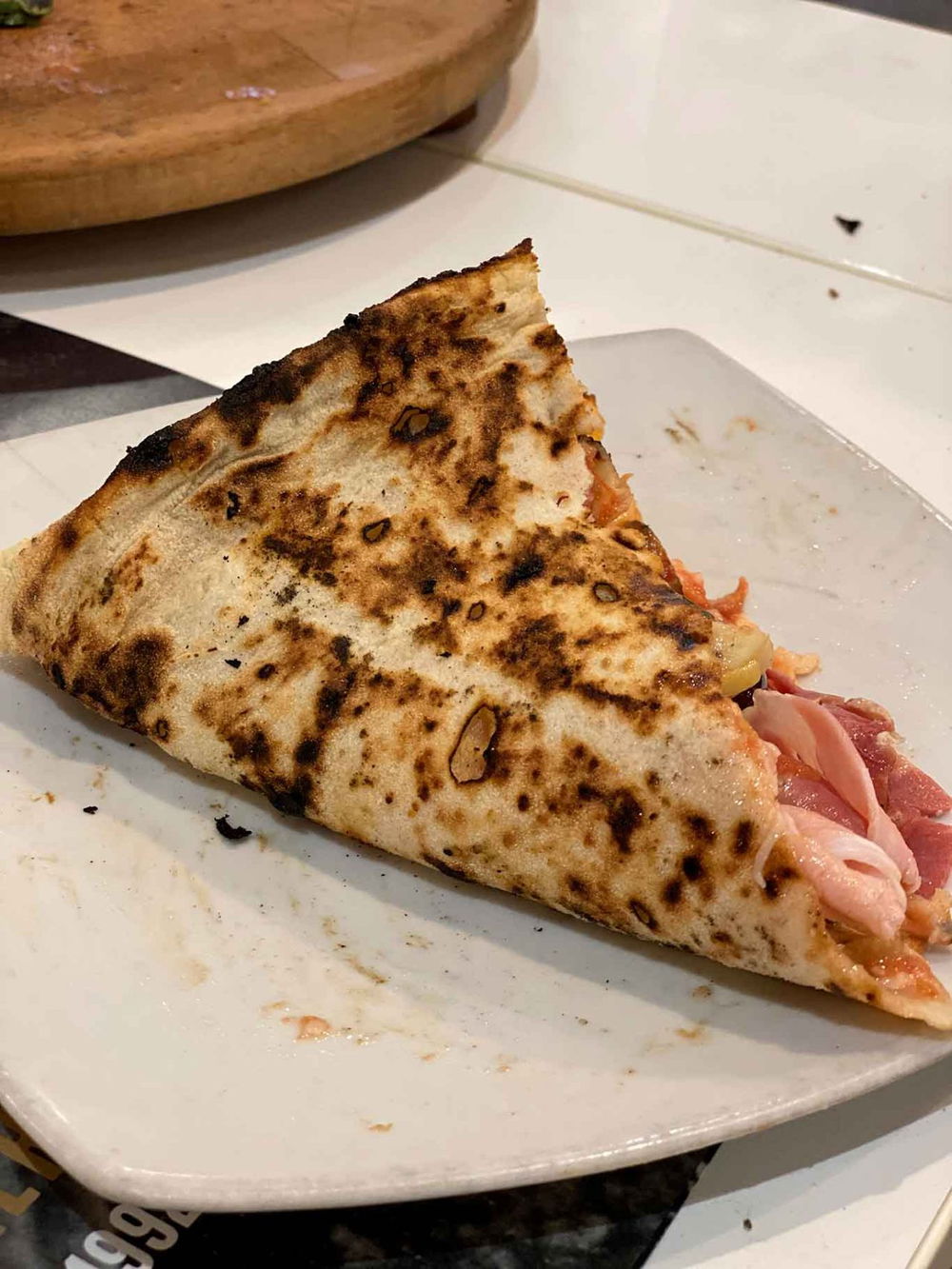la cottura della pizza capricciosa della pizzeria Luca Brancaccio a Caserta per il Campionato 2025