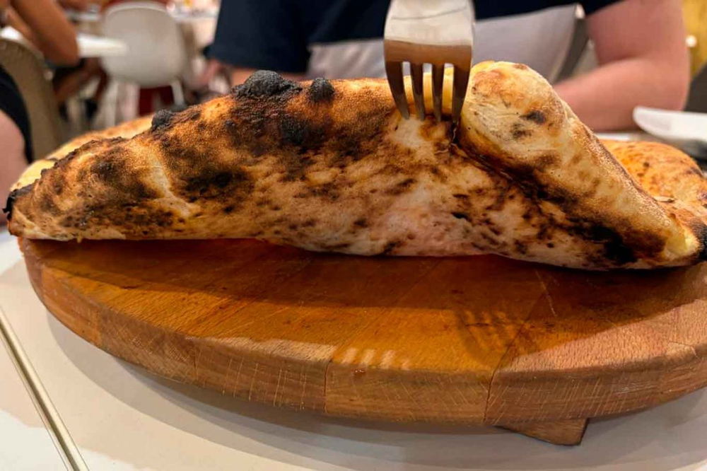 la cottura della pizza margherita della pizzeria Luca Brancaccio a Caserta per il Campionato 2025