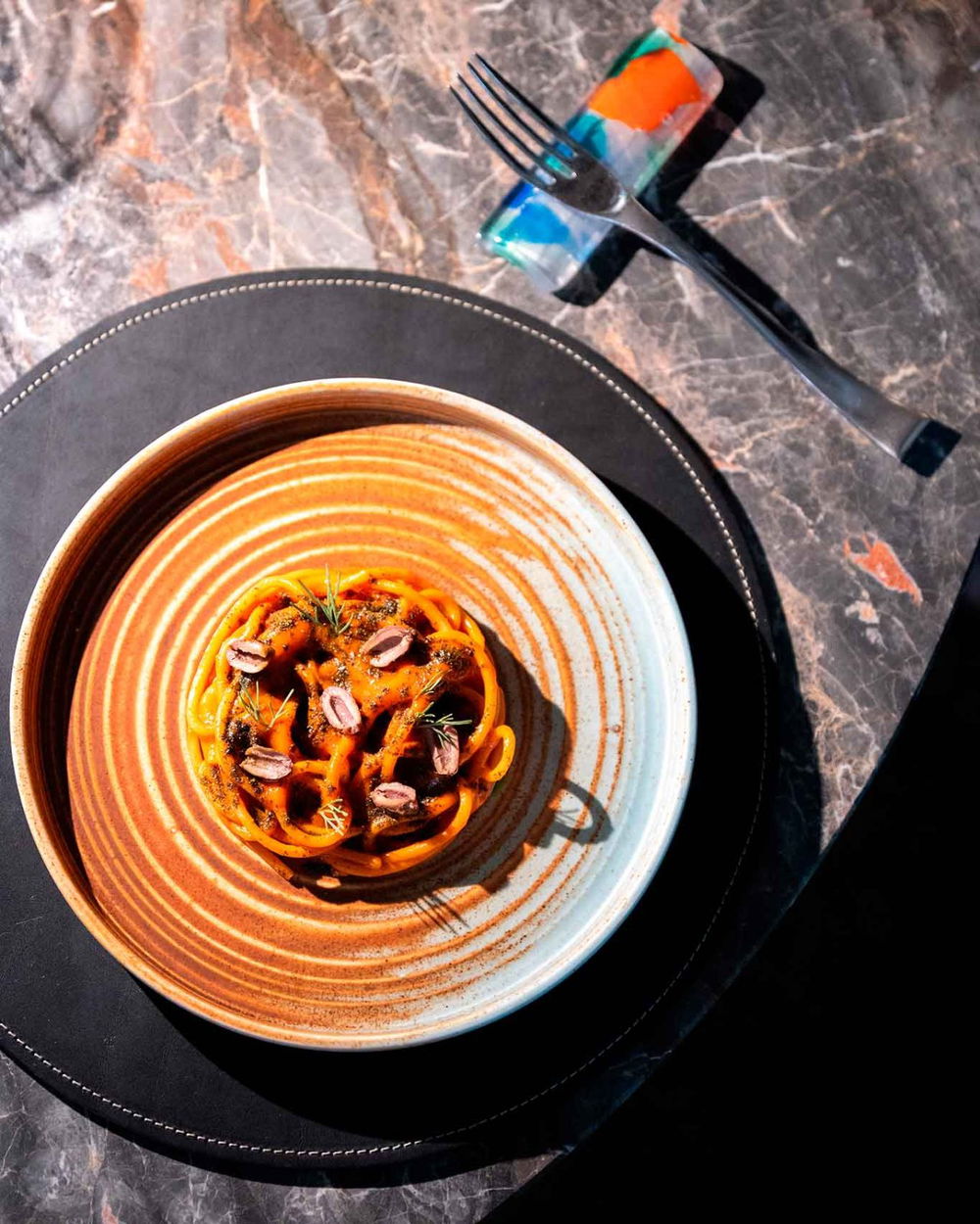 spaghetti, peperone, fico, olive del ristorante Wistèria a Venezia