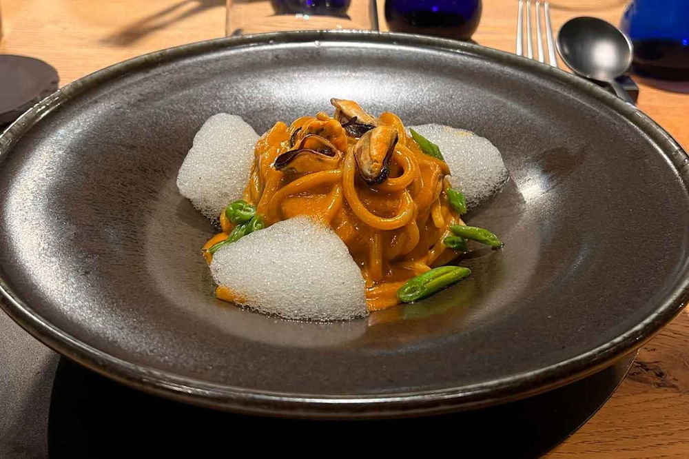 gli spaghetti con le cozze di Evo Bistrot Centumbrie ad Agello in Umbria