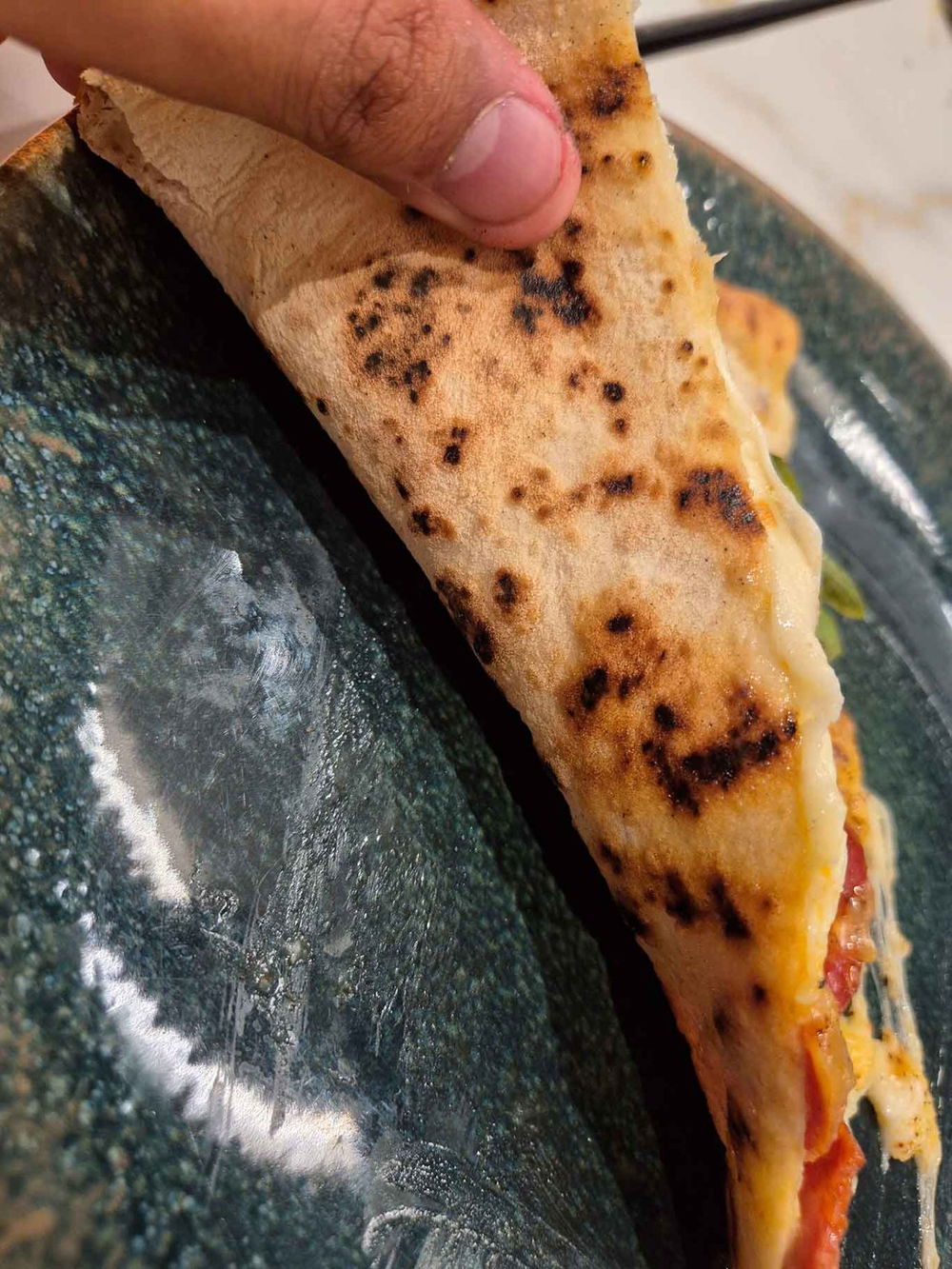 Non è una pizza per napoletani della pizzeria Bro. a Napoli, la cottura