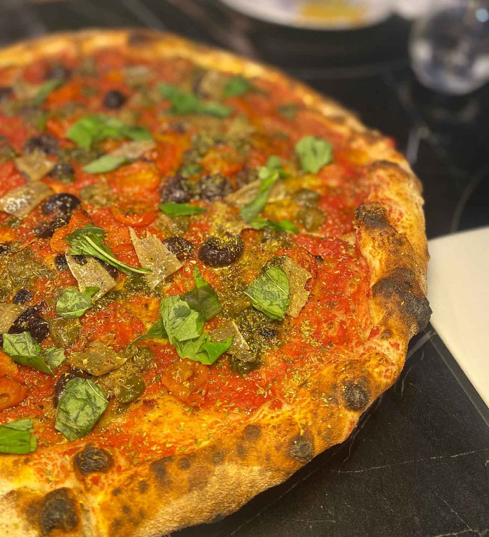 la pizza Marinara a ruota di carro di Pietro Fontana nella sfida con Francesco Martucci al Campionato della Pizza 2025