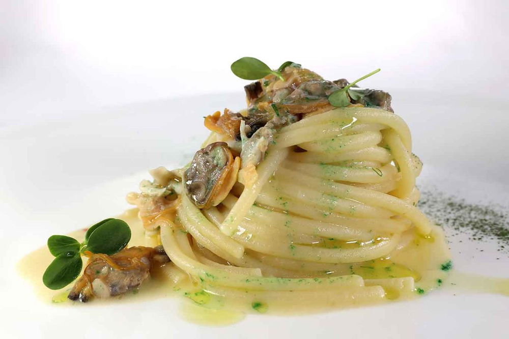 spaghettoni con vongole del ristorante Il Mestolo a Siena 