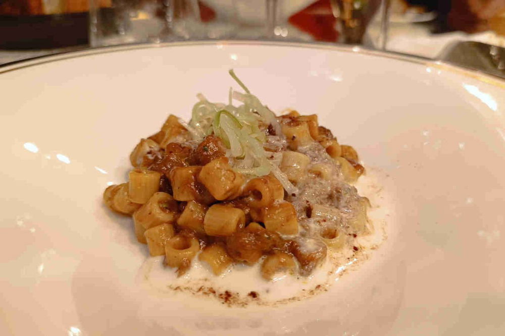 La coda alla vaccinara secondo Cafè Romano