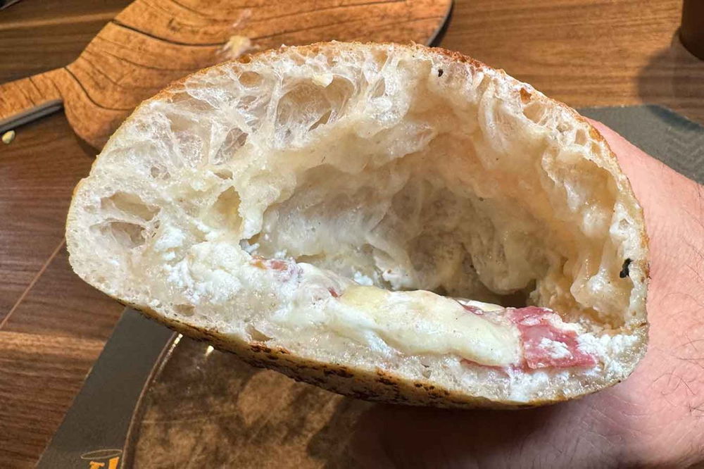 il ripieno con ricotta di Sasà Martucci alla Finale del Campionato della Pizza 2025