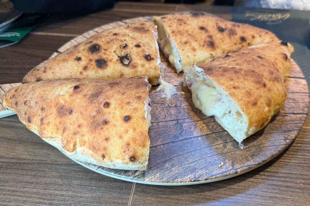 il ripieno con ricotta di Sasà Martucci alla Finale del Campionato della Pizza 2025