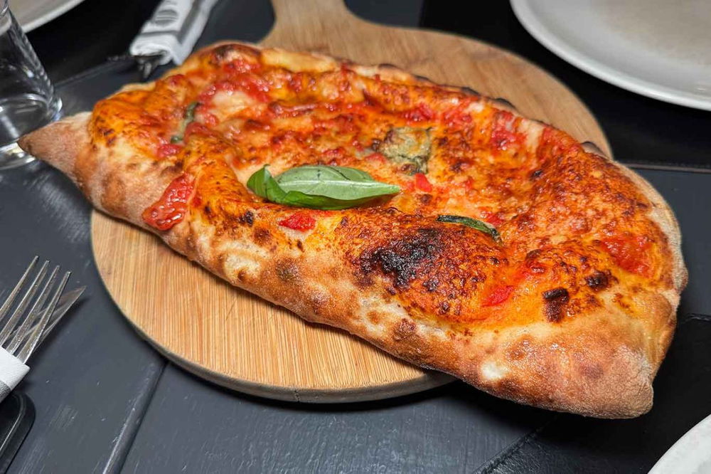 il ripieno al forno di Davide Ruotolo della pizzeria Palazzo Petrucci di Napoli alla Finale del Campionato 2025