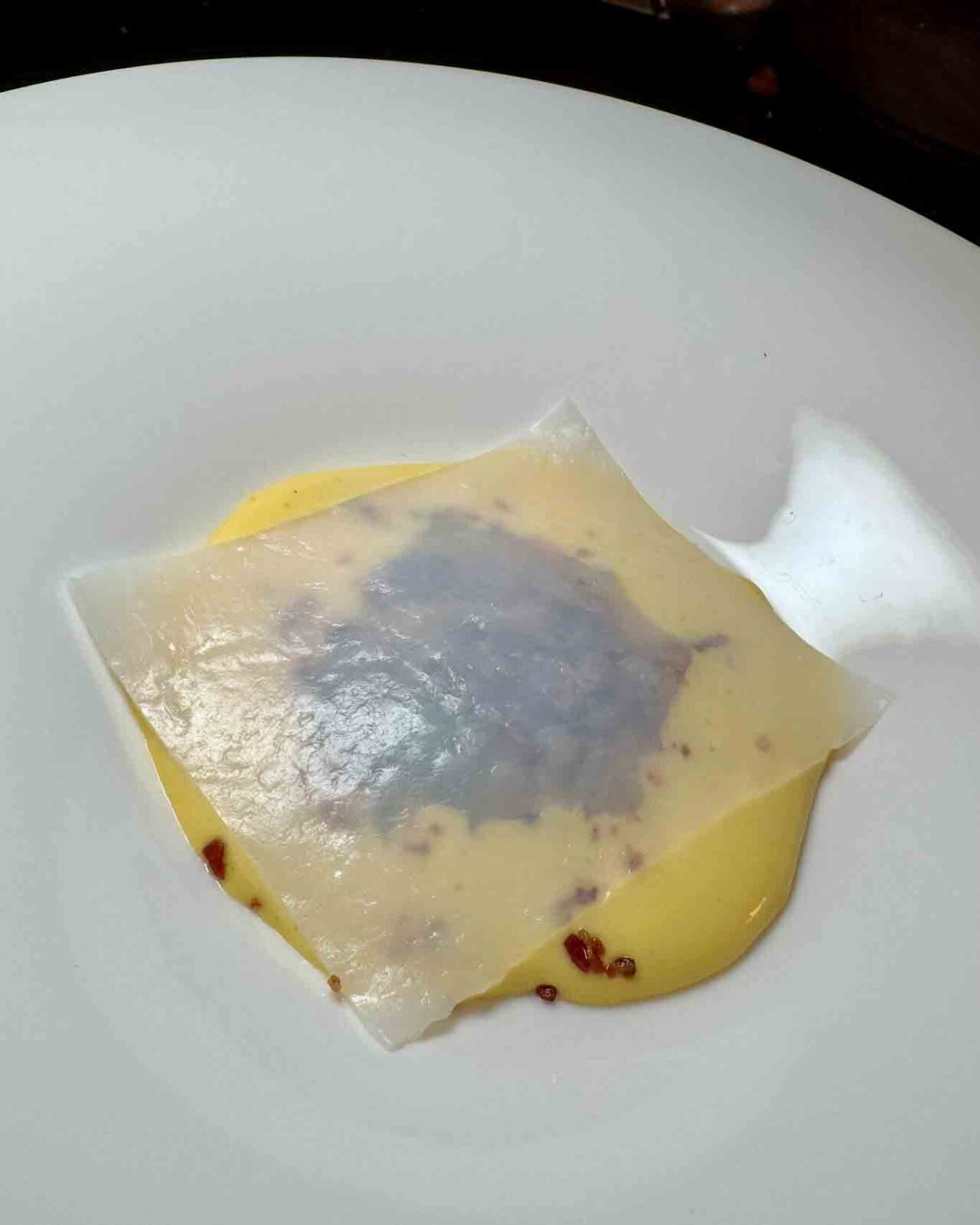 il calamaro in carbonara di Nino Di Costanzo alle Cene Stellari al ristorante Deschevaliers hotel de Bonart a Napoli
