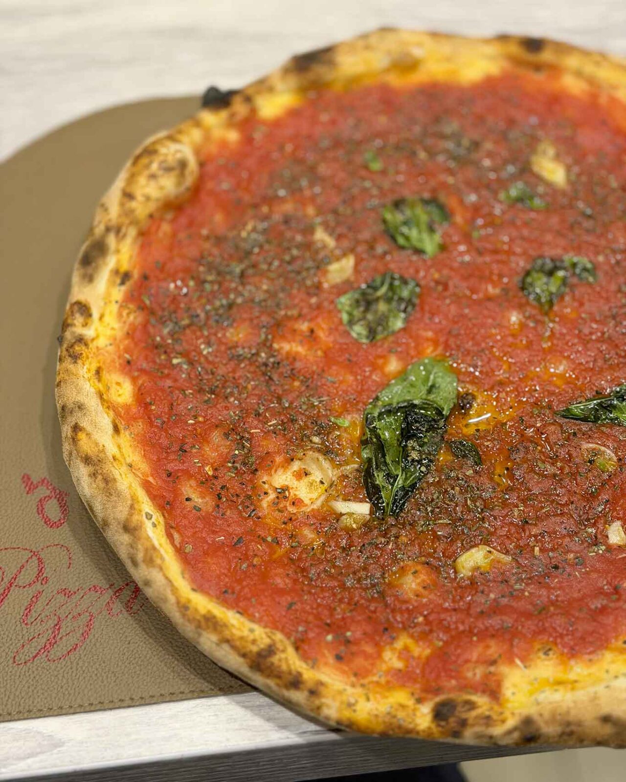 la pizza marinara della pizzeria Teresa Iorio Femmena e Fritta a Napoli per il Campionato 2026