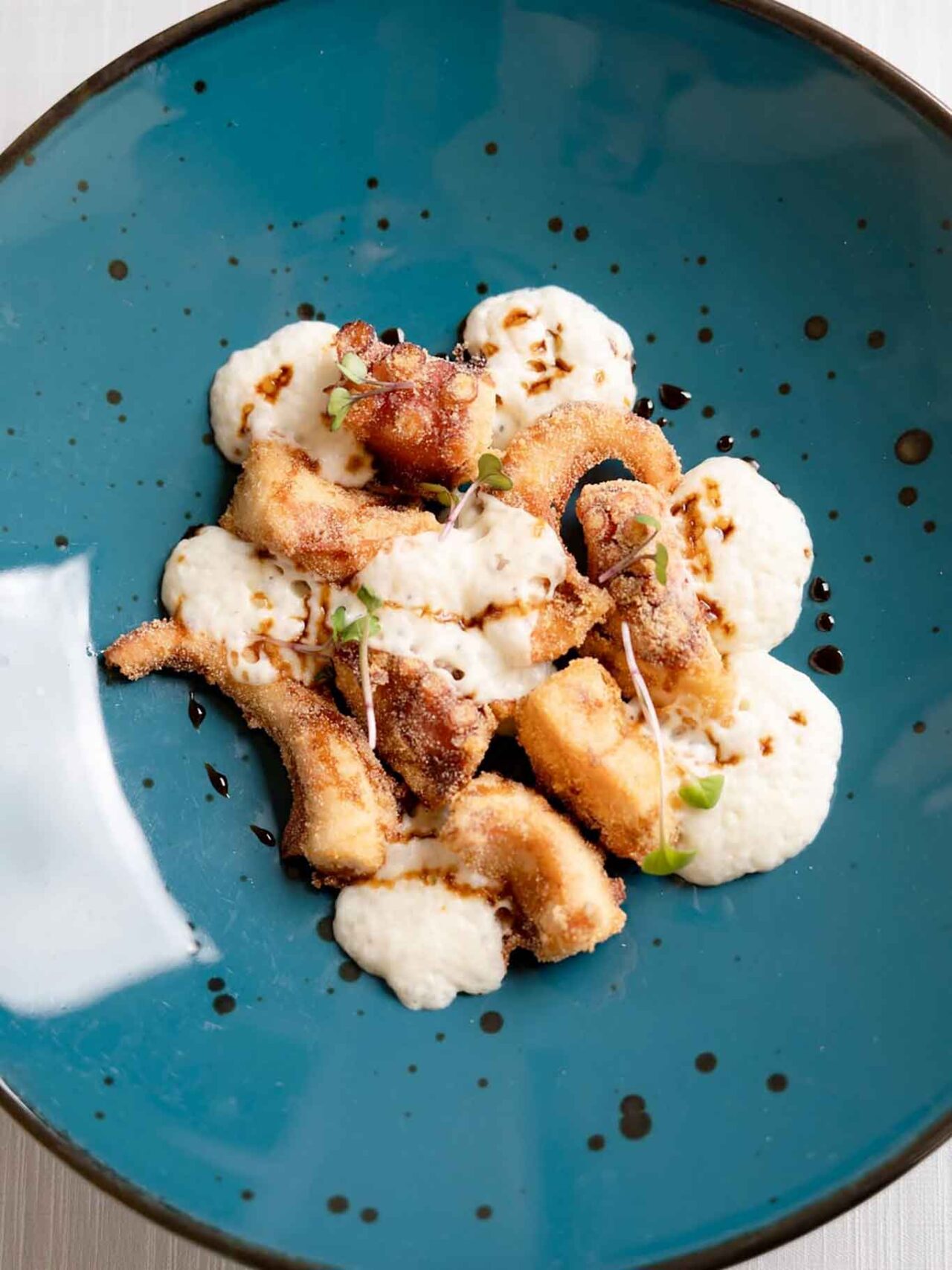 il polpo fritto di Osteria Frangipane, ristorante di pesce nel Palazzo Bianchi a Trani