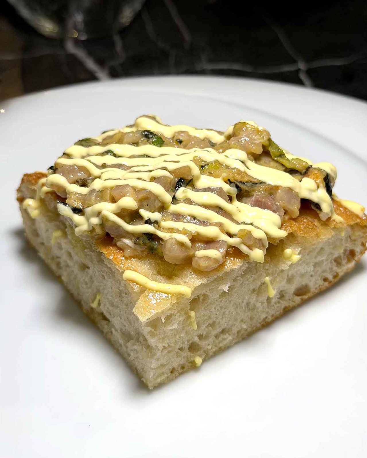 la pizza al padellino della pizzeria Da Pone a Neuchâtel in Svizzera